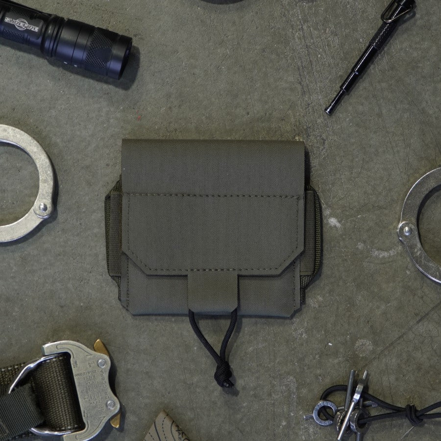 Low profile handcuff pouch